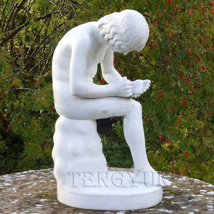 Marble statue boy with thorn