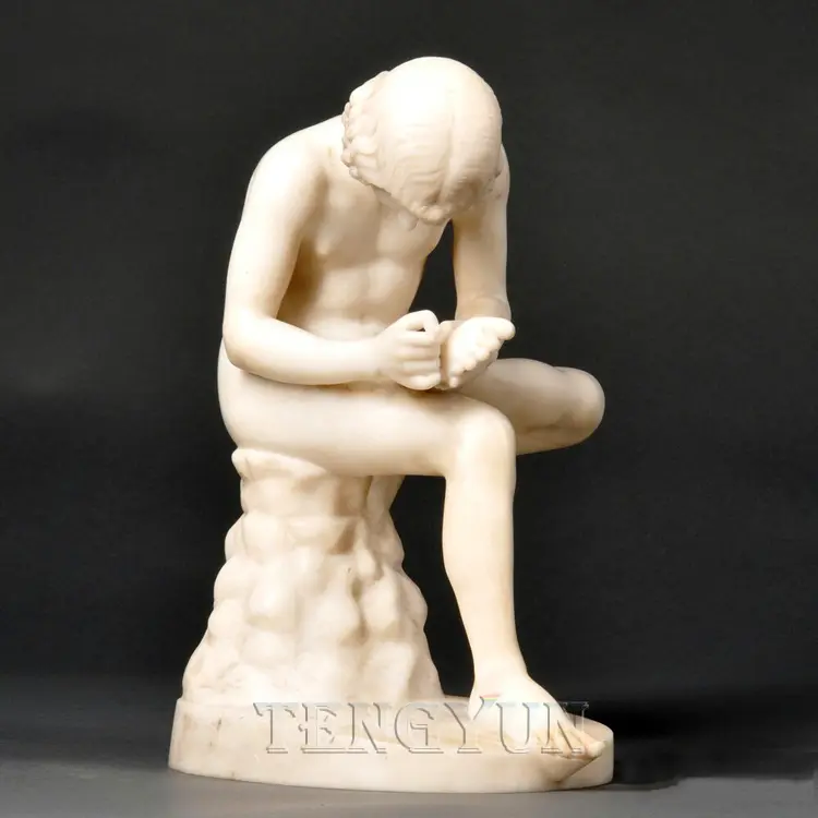 Marble statue boy with thorn