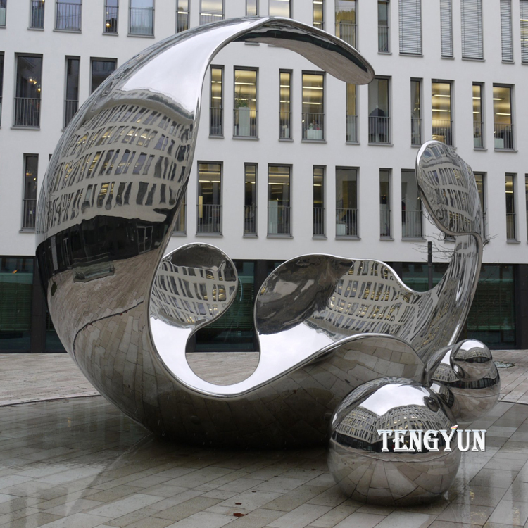 large stainless steel round sculpture