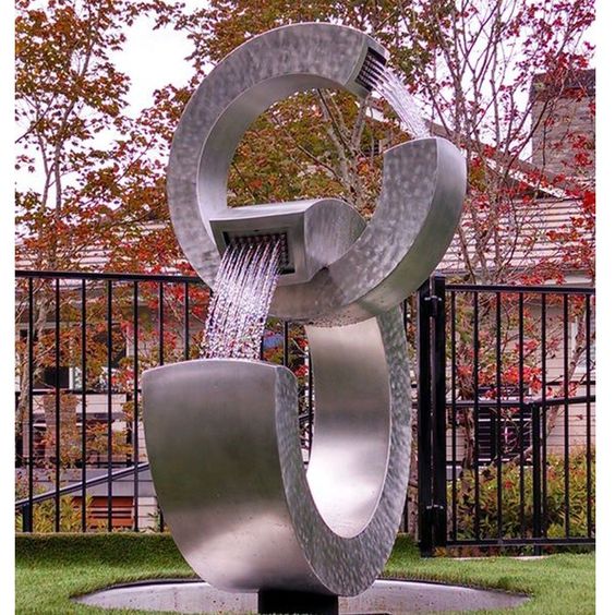 https://www.firststatue.com/outdoor-modern-large-size-stainless-steel-water-fountain-three-ring-sculptural-fountains-product/
