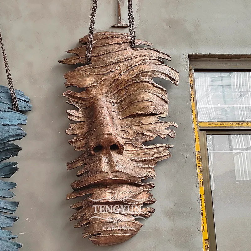 bronze face sculpture