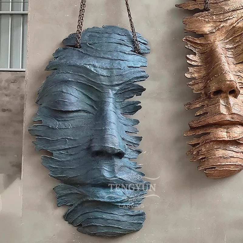 bronze face statue
