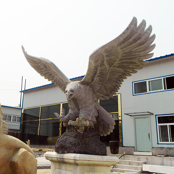 Grey marble eagle sculpture