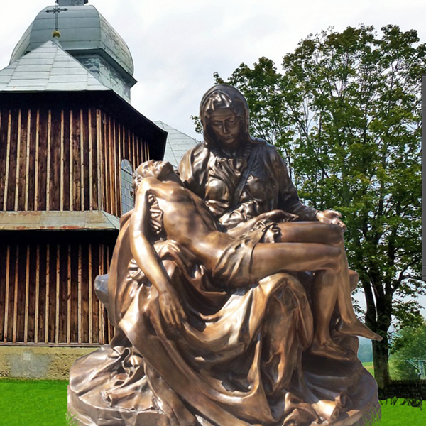 Mary holding Jesus statue