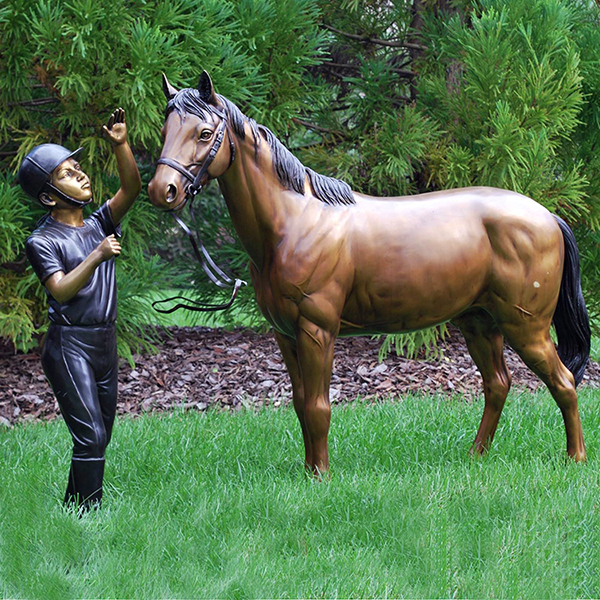bronze boy with horse statue